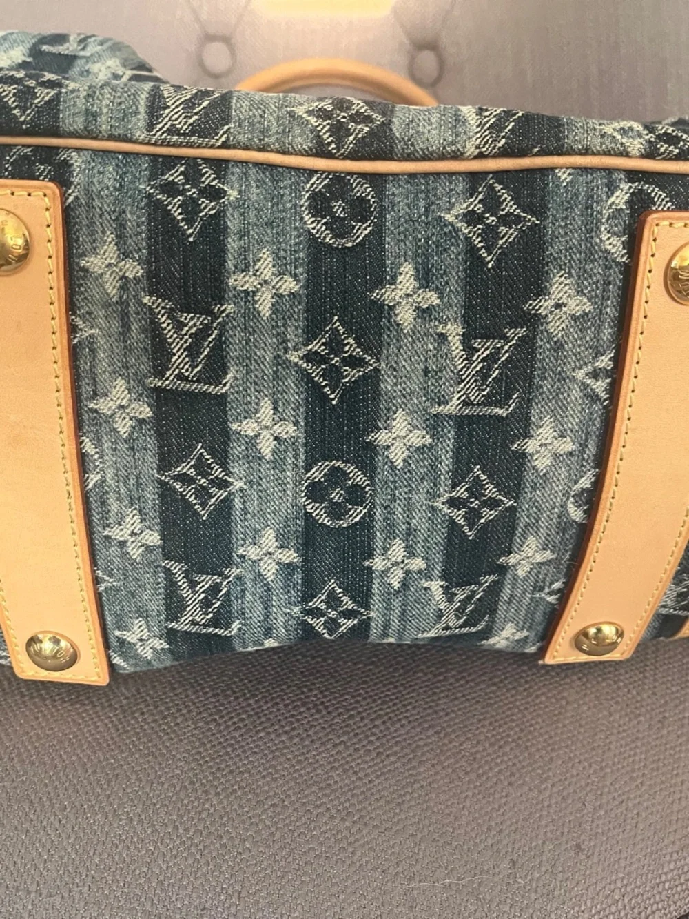 LV Denim Cloth weekender bag with leather trim and shoulder strap